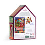 The back of the eeBoo Piece & Love Haunted House Shaped 100 Piece Puzzle box, shaped like a house, shows a vibrant haunted house image, puzzle piece sample, details, and logos. Text notes this eco-friendly children’s activity and its dimensions.