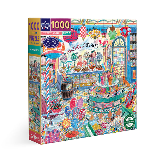 The eeBoo Piece & Love Sweet Shoppe 1000 Piece Puzzle features a vibrant sweet shop scene with candies, cakes, and treats. The colorful box displays jars, lollipops, and ice cream on recycled board labeled “Confectioners.”.