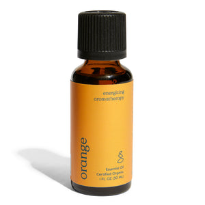 A small amber bottle with a black cap labeled Grove Co. Organic Orange Essential Oil - Energizing Aromatherapy. The vibrant orange label highlights its certified organic status and contains 1 fluid ounce (30 ml).