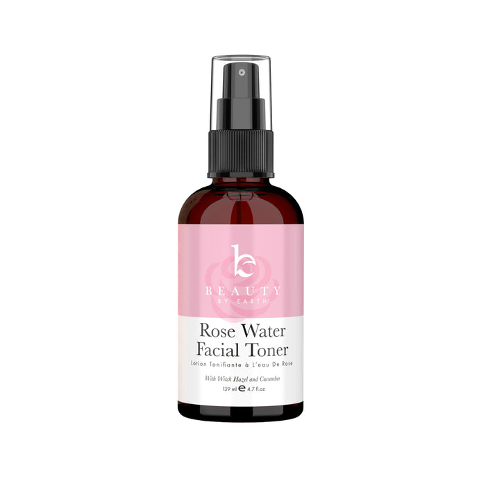 A brown spray bottle labeled Beauty Earth Rose Water Facial Toner with a pink and white label, containing 190 ml (6.7 fl oz) of product, featuring witch hazel and camellia.