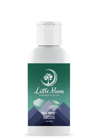 A white bottle of Little Moon Essentials Tea Tree All-Better Foot Lotion with a green and blue mountain-themed label and a flip-top cap.