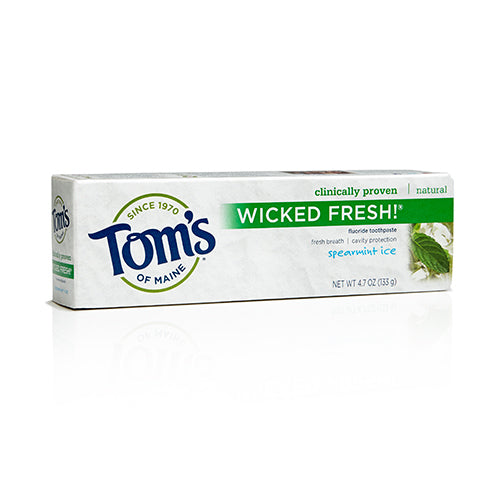 Toms of Maine Wicked Fresh Fluoride Toothpaste in spearmint ice flavor comes in a box featuring green and blue accents with a mint leaf image, emphasizing its natural ingredients and cavity protection.