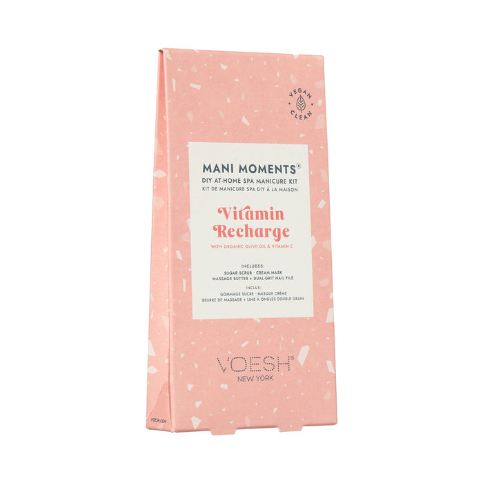 A pink, rectangular box labeled MANI MOMENTS DIY At-Home Spa Manicure Kit Vitamin Recharge by VOESH New York, featuring a vegan and clean icon and a terrazzo pattern.