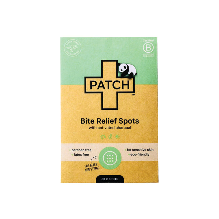 A box of PATCH Bite Relief Spots with activated charcoal, featuring a green and tan design, a cross symbol with a panda, and text highlighting benefits like paraben-free, latex-free, for sensitive skin, and eco-friendly.