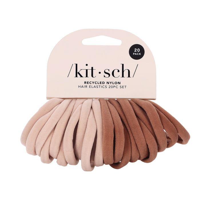 A pack of 20 neutral-toned hair elastics made from recycled nylon, displayed on a card labeled kitsch with shades ranging from light beige to brown.