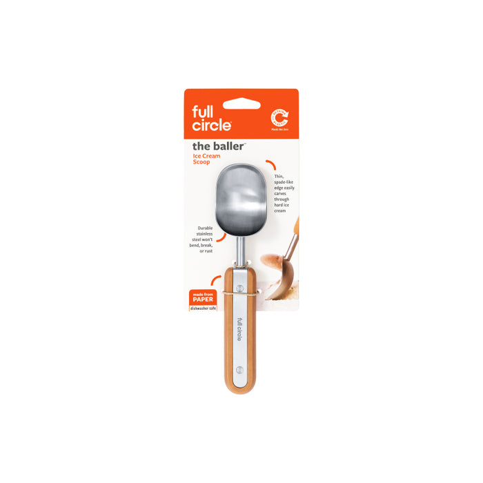 A Full Circle brand ice cream scoop called the baller in packaging, featuring a metal scoop and a wooden handle, with descriptive text and an ice cream graphic on the label.