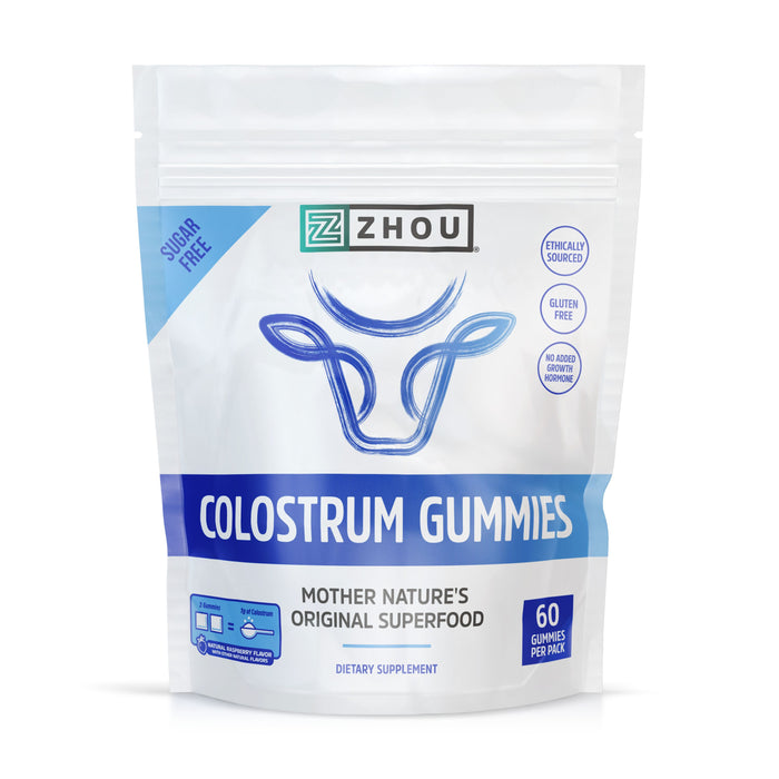 A package of Zhou Colostrum Gummies, labeled as sugar free, ethically sourced, gluten free, with no added sugar. The package contains 60 gummies and is described as Mother Natures Original Superfood.