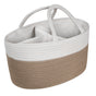 A two-toned oval woven basket with beige on the bottom and white on top, featuring two handles and four interior compartments.