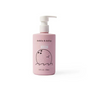 A pink bottle of dabble & dollop Coconut Gel with a pump dispenser, featuring a cute illustrated coconut character on the label. The bottle contains 10 fl oz (296 ml) and is labeled as a hair and body wash and shampoo.