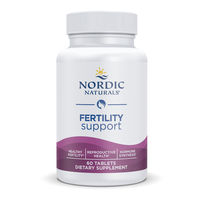 A white bottle of Nordic Naturals Fertility Support dietary supplement with 60 tablets. The label highlights benefits for healthy fertility, reproductive health, and hormone synthesis.