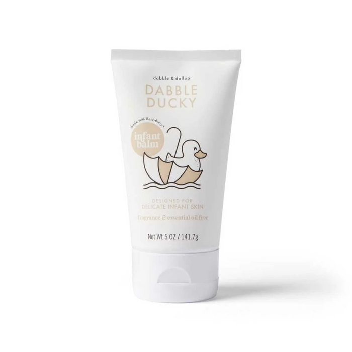 A white tube labeled Dabble Ducky Infant Balm with an illustration of a duck in a cracked eggshell. The product is for delicate infant skin and is fragrance and essential oil free. The tube size is 5 oz.