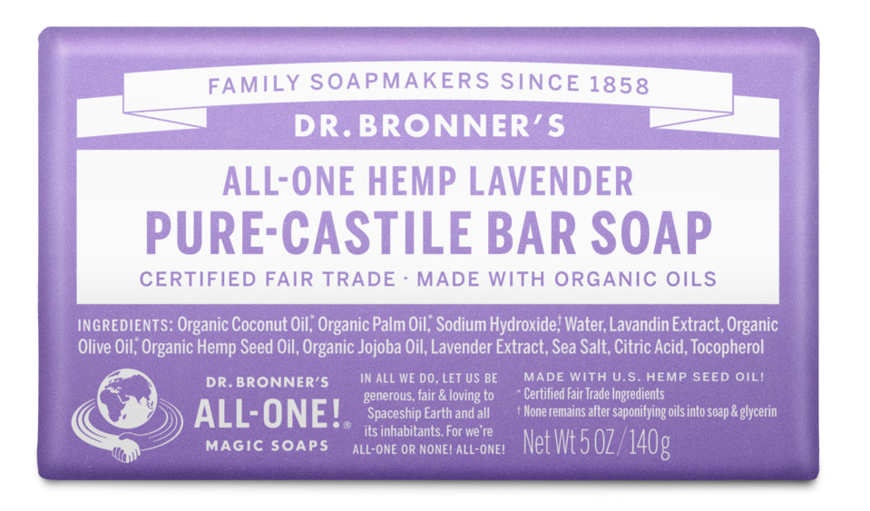 A lavender-colored bar of Dr. Bronner’s Pure-Castile Bar Soap with hemp and lavender. The label highlights its organic ingredients, fair trade certification, and weight of 5 oz (140 g).