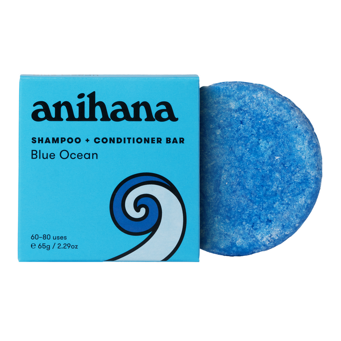 A blue Anihana shampoo and conditioner bar sits next to its matching box, which reads anihana Shampoo + Conditioner Bar Blue Ocean and features a wave illustration on a blue background.