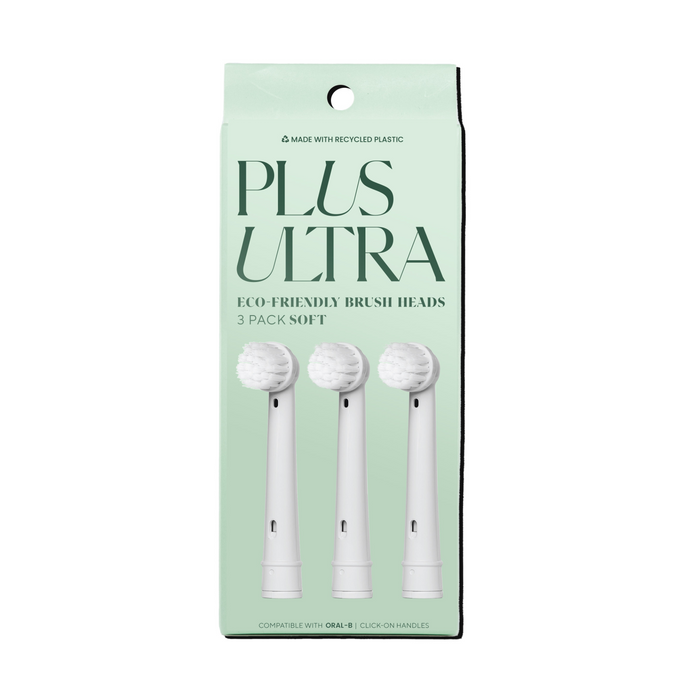 A mint green box labeled PLUS ULTRA containing three white eco-friendly replacement brush heads for electric toothbrushes, shown upright on the packaging.