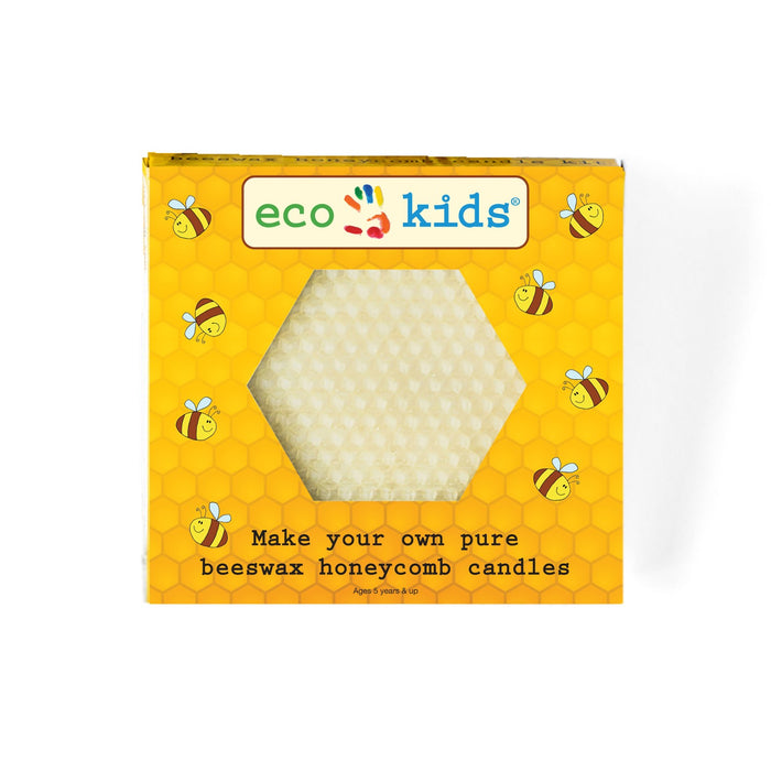 A yellow eco-friendly kids’ kit box with a hexagonal window showing beeswax and illustrations of smiling bees. Text reads: “Make your own pure beeswax honeycomb candles.”.
