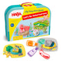 HABA My Very First Games - Let’s Be Veterinarians set featuring a carrying case, wooden animal figures, a die, and medical toy accessories including bottles and a thermometer for an educational board game.
