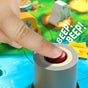 A close-up of a finger pressing a red button on the HABA Bamboo Rally Cup / Hype in the Jungle Game for kids 6+, with BEEP! BEEP! illustrated. The educational board features colorful cartoon animals and lush jungle scenery in the background.