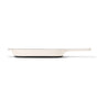 A side view of a light-colored, shallow frying pan with a long handle, set against a plain white background.