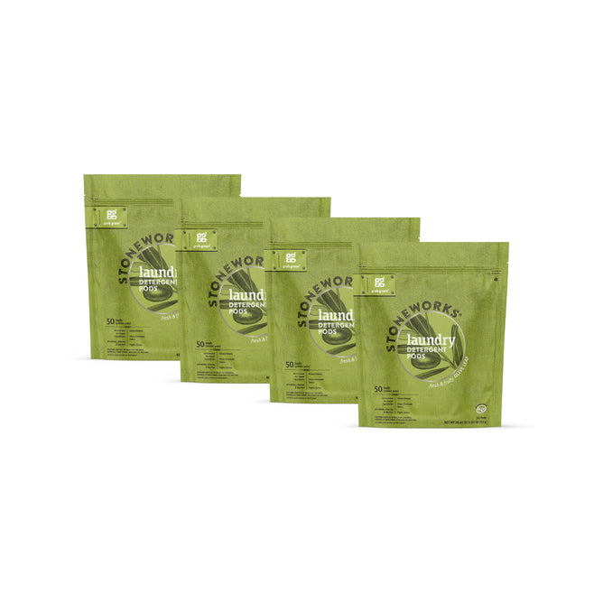 Four green pouches of grab green Stoneworks Laundry Detergent Pods - Olive Leaf are lined up on a white background, each displaying the brand logo and product details in white and black text.
