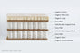 Cross-section of the Extra Firm Mattress by Avocado Green Mattress, a certified organic, heavy-duty mattress. The labeled layers include organic cotton, organic wool, organic latex, coco pad, individually wrapped coils, and organic cotton canvas.