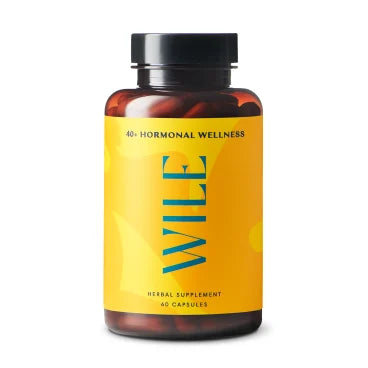 A brown bottle with a yellow label reading WILE 40+ Hormonal Wellness, containing 40 herbal supplement capsules. The bottle has a black cap and is set against a white background.