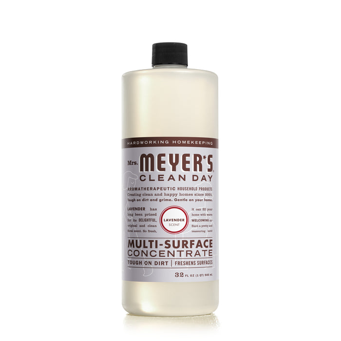 A bottle of Mrs. Meyers Clean Day Multi-Surface Concentrate in lavender scent, featuring a brown and white label with product details, standing upright on a white background.