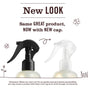 Two Mrs. Meyer's Room Freshener spray bottles—one with a black cap, one with a clear cap—stand side by side. Text above says, 
