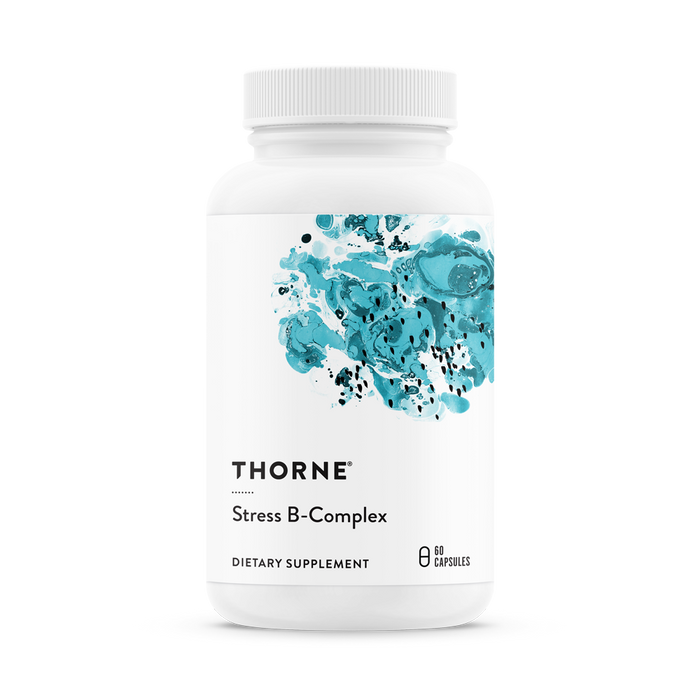 A white bottle of Thorne Stress B-Complex dietary supplement with a blue abstract design on the label, containing 60 capsules.