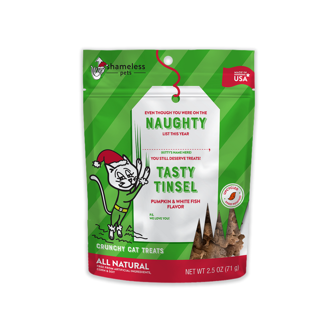 Shameless Pets Tasty Tinsel Crunchy Cat Treats, Naughty List, features flavors of pumpkin, whitefish, and upcycled sunflower seeds in a festive 2.5 oz package adorned with a cartoon cat design.