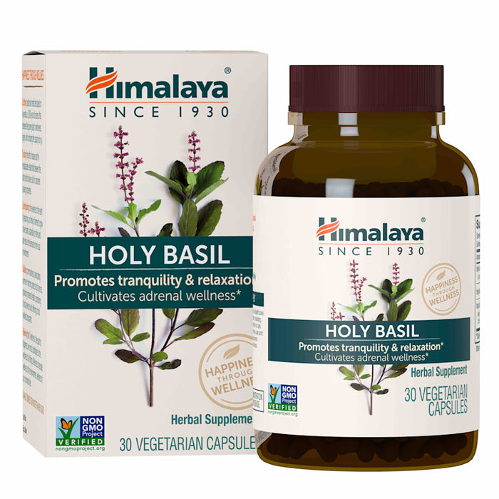 The Himalaya Holy Basil herbal supplement features a basil plant illustration on the bottle and box, emphasizing stress relief, tranquility, and adrenal wellness. This Ayurvedic product contains 30 non-GMO vegetarian capsules for relaxation.