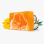 Discover the Mango Coconut Soap Bar by Soapymania, featuring a vibrant orange and white swirl with luscious mango and split coconut accents, embodying the essence of handmade natural beauty.