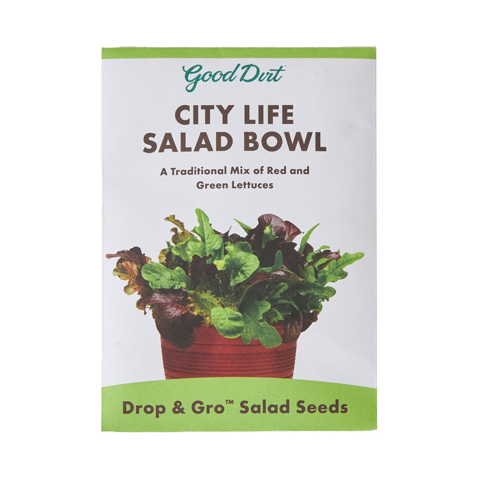 Seed packet labeled Good Dirt City Life Salad Bowl with an image of a pot filled with green and red lettuce. Text reads A Traditional Mix of Red and Green Lettuces and Drop & Gro Salad Seeds.