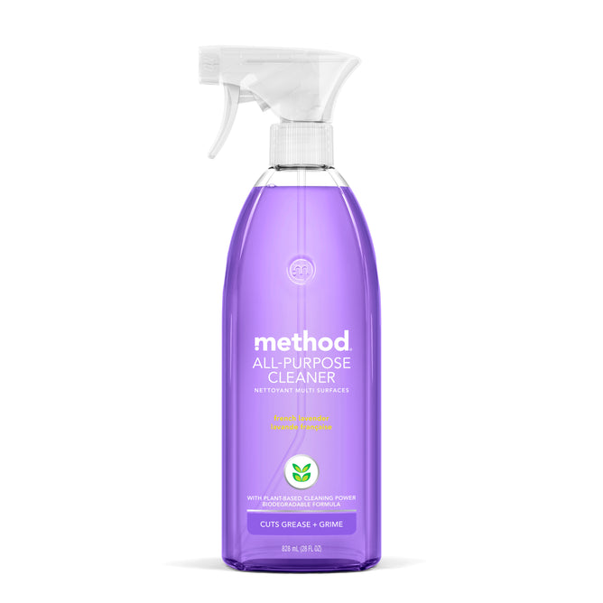 A translucent Method All Purpose Cleaner spray bottle with purple liquid highlights its natural cleaning power. The label says Cuts Grease + Grime. Featuring a lavender and rosemary scent, it comes with a clear trigger spray top.