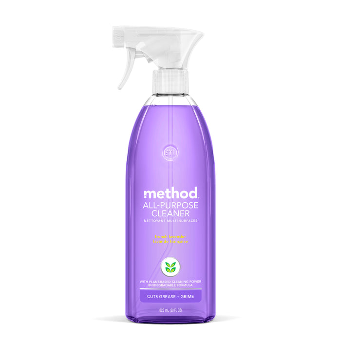 A translucent Method All Purpose Cleaner spray bottle with purple liquid highlights its natural cleaning power. The label says Cuts Grease + Grime. Featuring a lavender and rosemary scent, it comes with a clear trigger spray top.