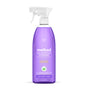 A translucent Method All Purpose Cleaner spray bottle with purple liquid highlights its natural cleaning power. The label says Cuts Grease + Grime. Featuring a lavender and rosemary scent, it comes with a clear trigger spray top.
