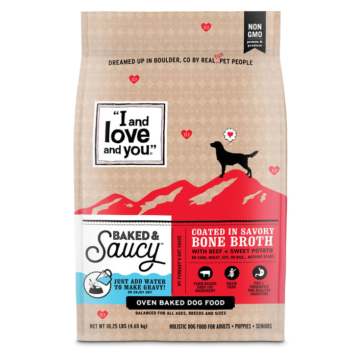 Bag of “I and Love and You” Baked & Saucy oven baked dog food with beef and sweet potato, featuring a black dog silhouette on red mountains, text details, and icons for non-GMO and holistic nutrition.