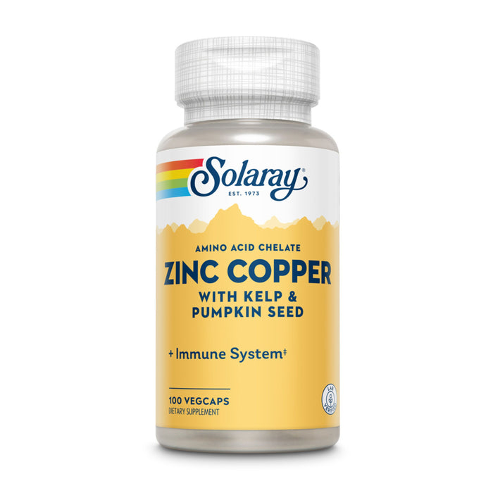 A bottle of Solaray Zinc Copper dietary supplement, featuring a yellow and white label with rainbow accents. The label highlights amino acid chelate, kelp, pumpkin seed, and support for the immune system.