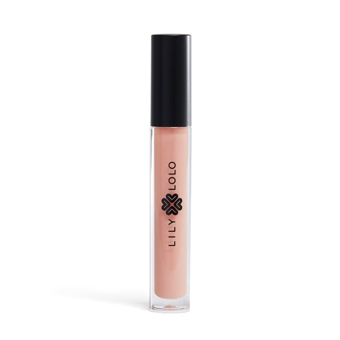 A clear tube of Lilly Lolo lip gloss with a black cap, containing a light nude pink shade. The brand name and logo are printed vertically on the tube. The background is white.