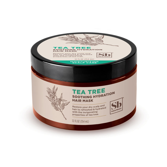 A brown jar labeled Tea Tree Soothing Hydration Hair Mask by Soapbox, featuring an illustration of tea tree leaves. The container holds 12 fl oz (354 mL) and includes product details in green and black text.