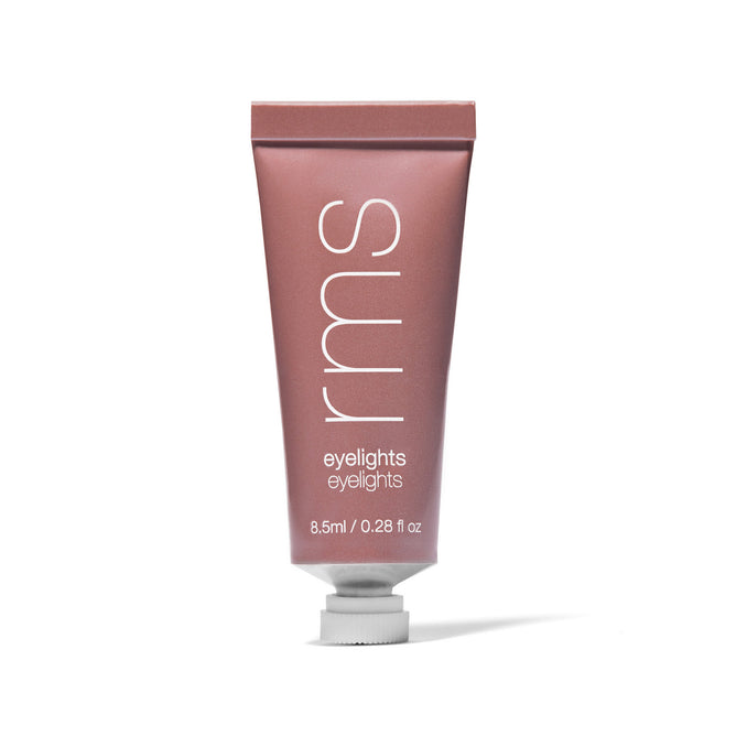 A metallic pink tube labeled rms eyelights with a white cap, standing upright. The tube indicates it contains 8.5 ml (0.28 fl oz) of product.