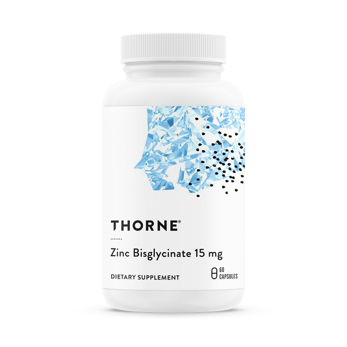 A white bottle of Thorne Zinc Bisglycinate 15 mg dietary supplement, featuring a blue abstract design and black dots on the label. The bottle contains 60 capsules.