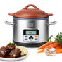 The VitaClay® Chef VITACLAY NourishingPot™- VM1688-9, a natural clay slow cooker with a digital display, sits on the countertop. Nearby are carrots, garlic, parsley, and a plate of braised short ribs served with mashed potatoes and sauce.