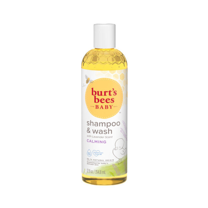 A bottle of Burt’s Bees Baby Shampoo & Wash with Lavender Scent, labeled as calming and made with 98.7% natural origin ingredients. The bottle is clear with a yellow liquid and a white cap.