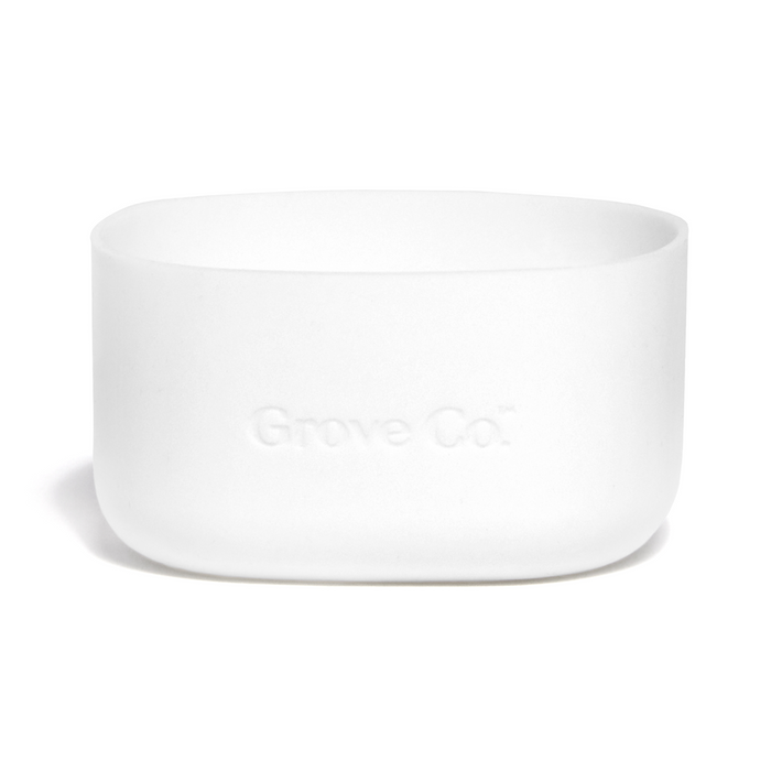 A white, rectangular, silicone container with rounded edges and the words Grove Co. embossed on the front. The container is empty and shown against a plain white background.