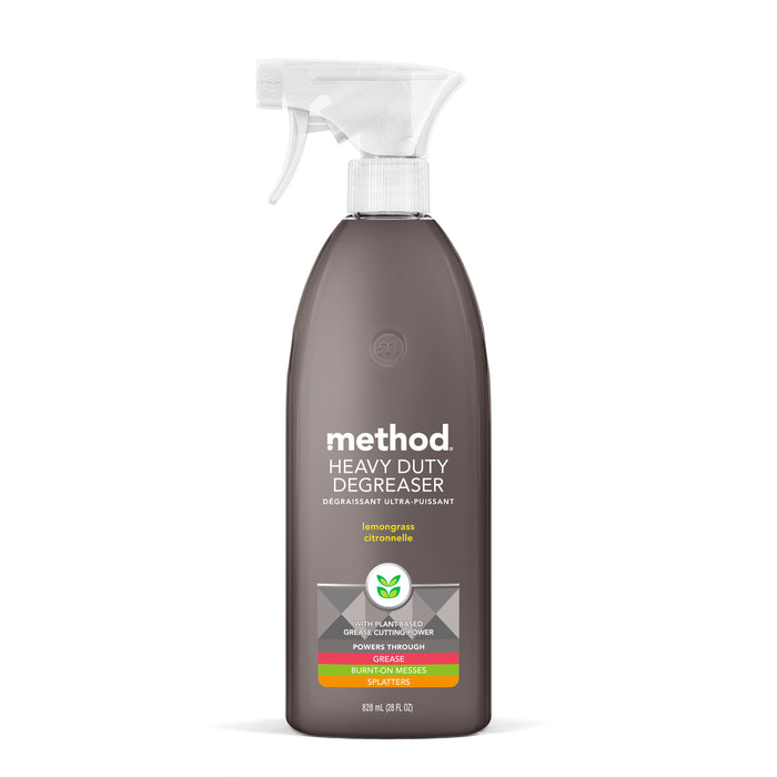 A brown spray bottle of Method Heavy Duty Degreaser with a white trigger. The label indicates a lemongrass citronella scent and highlights grease-cutting power for tough kitchen messes. The bottle is 828 mL (28 fl oz).