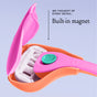 A pink and orange razor with an open protective cover, revealing a white blade head and a teal button marked "up." The text reads: "We thought of every detail: Built-in magnet." The background is a light shade of blue.