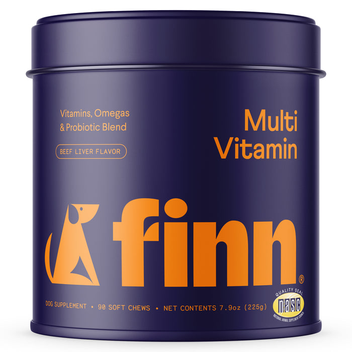 A purple container of Finn Multi Vitamin dog supplements, labeled as a beef liver flavor, with vitamins, omegas, and probiotic blend. The tin holds 98 soft chews and has orange and yellow text.