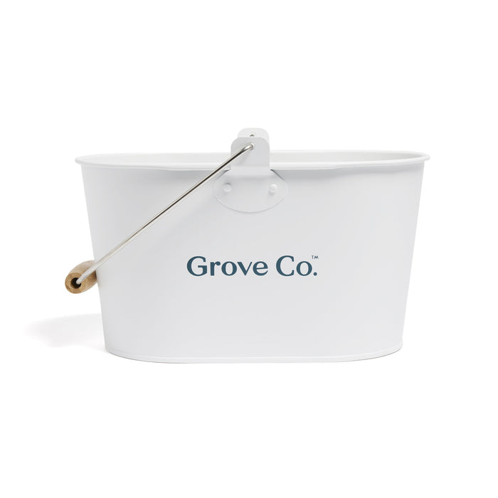 A white oval metal bucket with a wooden-handled metal carrying handle and the words Grove Co. printed on the side.
