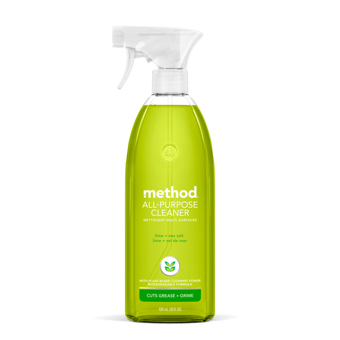A clear spray bottle of Method All-Purpose Cleaner with green liquid, labeled lime + sea salt scent. The label highlights biodegradable formula and grease-cutting power. The bottle has a white trigger spray top.