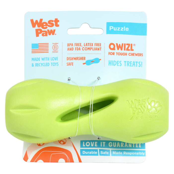 A green West Paw chew toy for dogs is packaged on a blue and white card labeled Puzzle, QWIZL for tough chewers, BPA free, dishwasher safe, and hides treats.